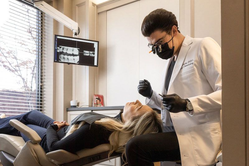 dr-mason-with-patient-mason-r-davis schedule appointment with mason r davis dental team